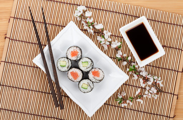 Sushi set with fresh sakura branch