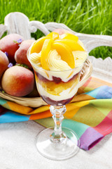 Layer fruit desserts on wooden tray. Summer garden party