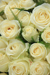 White roses in a wedding arrangement