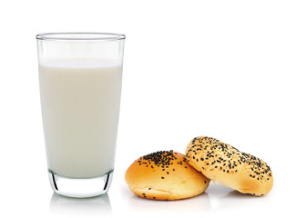 glass of milk and bread isolated on white background