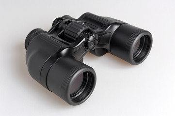 Black binoculars on gray
