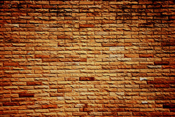 Naklejka premium Dark color of orange brick wall.