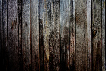 Dark color of old wooden walls.