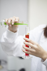 Scientist doing chemical test in laboratory