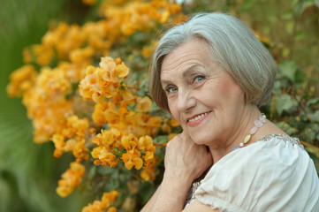 Woman with yellow flowers