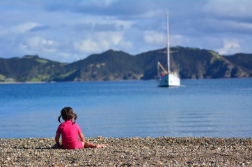 Fototapeta na wymiar Little girl playing beach