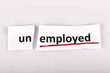The word unemployed changed to employed on torn paper