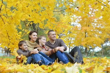 Family of four sitting