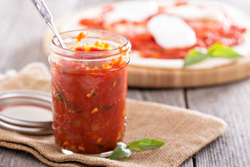 Pizza sauce in a jar
