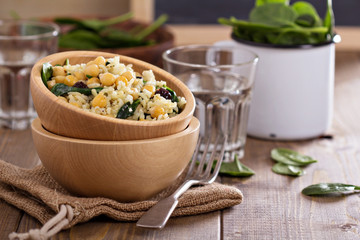 Salad with rice, chickpeas, spinach, raisins