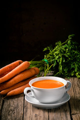 Homemade carrot soup with fresh ingredients