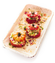 Stuffed tomatoes with couscous and herbs