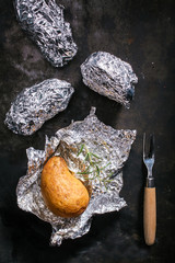 Potatoes roasted in aluminium foil