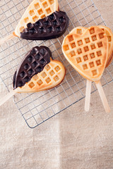 Romantic heart shaped waffle lollipops