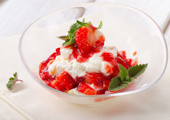 dessert with strawberries and mint leaf