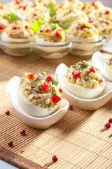 stuffed eggs with ham, red pepper and dill