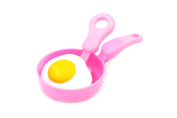 toy plastic pan with spade of frying pan and fried egg
