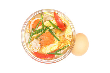 fried beaten egg with minced pork in clear soup (omelet soup)