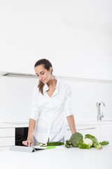 Young Woman Preparing Food in the Kitchen