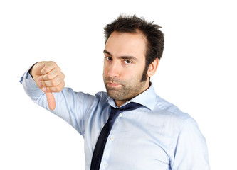 Young businessman showing thumbs down sign