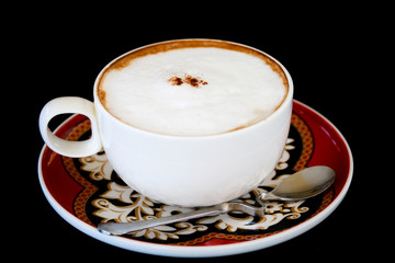 Cappuccino coffee in a white cup