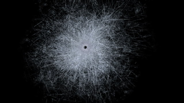Gun shot hitting glass