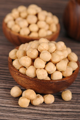 Roasted hazelnuts in wooden bowl
