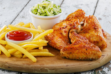 fried chicken wings with french fries