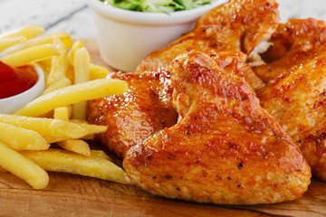 fried chicken wings with french fries
