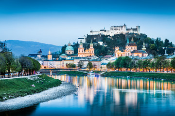 Salzburg skyline with river Salzach at dusk, Austria