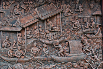 Stone Mural depicting Thai life