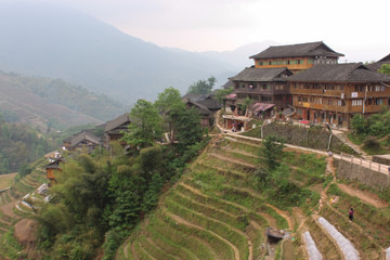 View with Dragon Ridge Terrace of rice fields and wood house