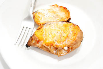 Hot Sweet Potato Served with Butter and Black Pepper