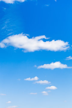 few light clouds in blue sky