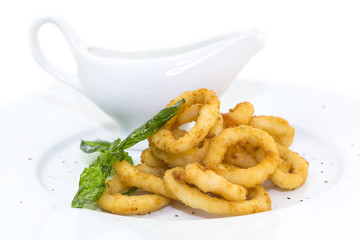 fried calamari rings on a white background