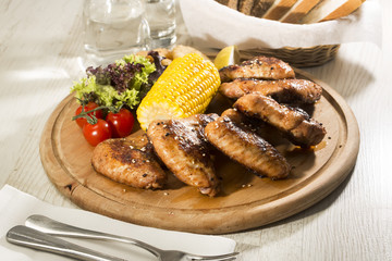 chicken wings are grilled