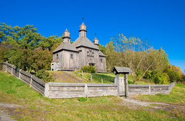 Fototapeta premium Old wooden church in Pirogovo, Ukraine