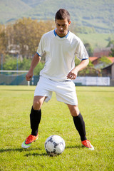 soccer player shooting