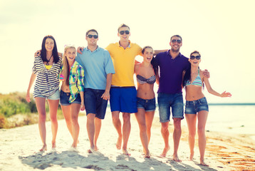 Fototapeta premium group of friends having fun on the beach