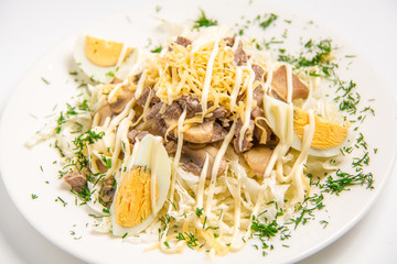 salad with eggs, mushrooms and meat