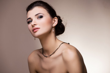 Fashion woman portrait with jewelry. Accessory.