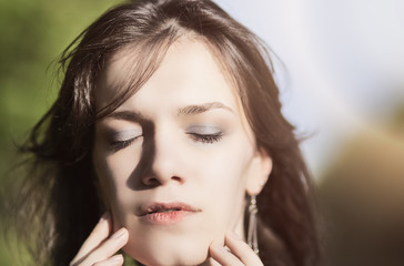 Obraz premium Portrait of Beautiful Romantic Girl Outdoors. Model With Long Ha