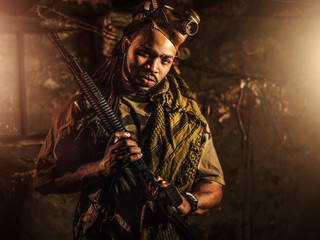 guerrilla freedom fighter with gun in bunker