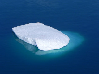 white ice, blue ocean