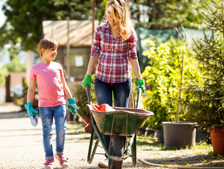 Mother and daughter gardening together.Family concept.