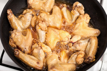 Asian chicken wings cooking