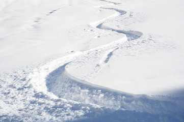 Fototapeta na wymiar Ski track in fresh snow