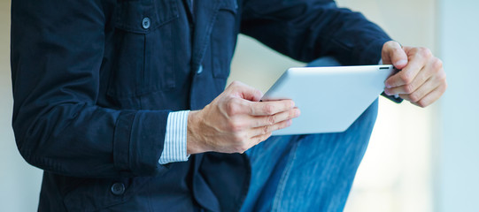 men holding digital tablet