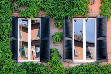Fototapeta na wymiar Window Reflections in Italy