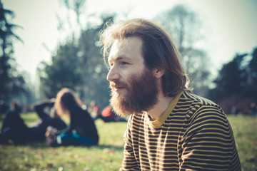 young bearded stylish handsome hipster man